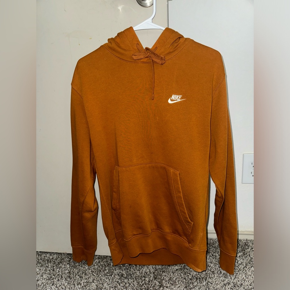 COPY - Woman’s Nike Sweatshirt in rustic yellow/orange in the size SMALL